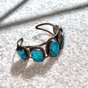Cuff bracelet with turquoise gems